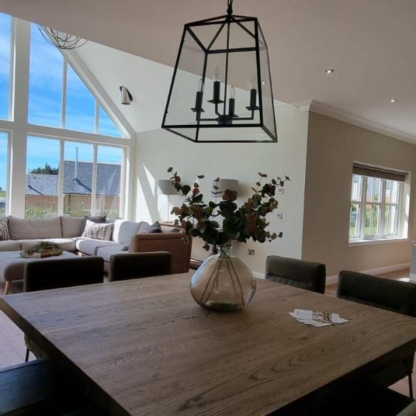 Picture of the dining / living / kitchen open space with large window